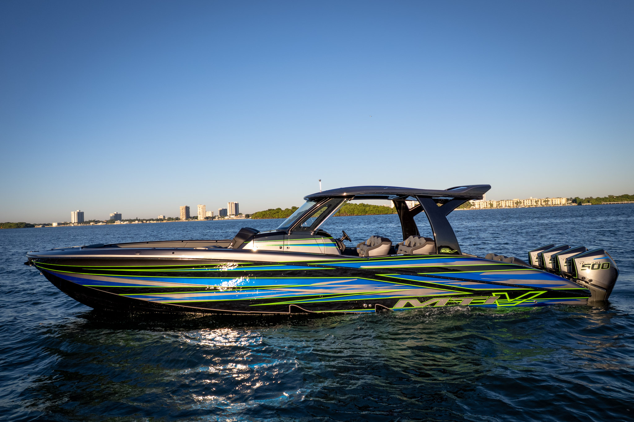 High-performance center console at speed, offshore South Florida